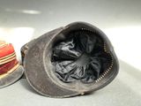 two hats sitting next to each other on a table