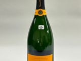 a close up of a bottle of champagne on a white background