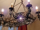 a chandelier that is hanging from the ceiling