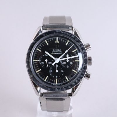 an image of a close up of a watch on a white surface