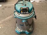 a machine that is sitting on the ground in the yard
