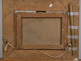 a picture of an old wooden frame with a picture on it