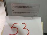 a sign that says 553 on the side of a refrigerator