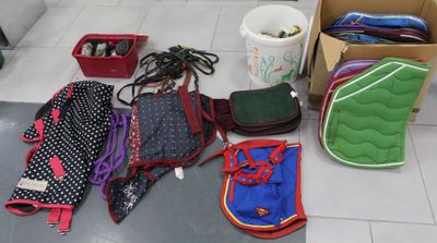 many bags and other items that are on the floor