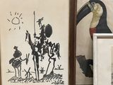 a picture of a picture of a man riding a horse and a picture of a toucan