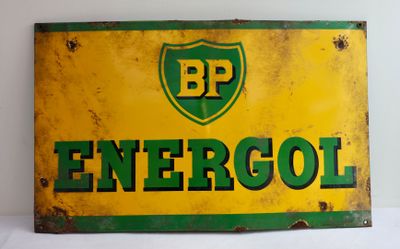 an old bp energy sign is displayed on a white surface
