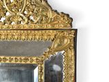 a mirror that is sitting on the wall in the room