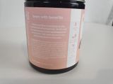 a jar with a label on it sitting on a table
