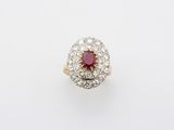 a ruby and diamond cluster ring