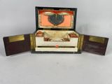 a small wooden box with a heart in it