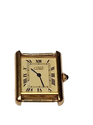 an image of a gold watch with roman numerals on the face