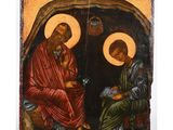 an old painting of two men sitting in a cave