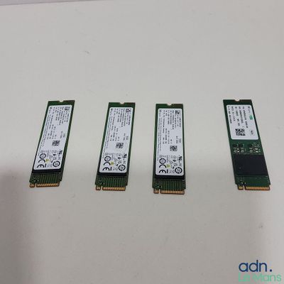 a close up of three different types of ram cards on a table