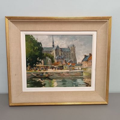 tableau encadré représentant une église et une rivière