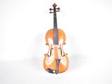 a violin that is sitting on a white surface