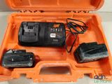an orange tool case with two batteries and a charger in it