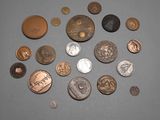 a lot of coins that are on the table