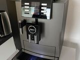 a coffee machine sitting on a counter in a kitchen