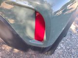 a close up of the tail light of a car