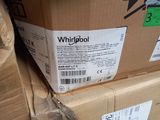 a box of whirlpool sitting on top of a pile of boxes
