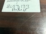 a label on a wooden table that says league free