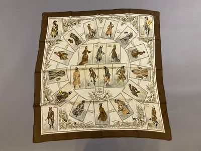 a brown and white scarf with a picture of people on it