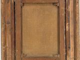 a close up of a picture frame hanging on a wall