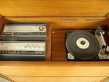 a record player sitting inside of a wooden case