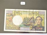 une photo d'un billet de banque sur lequel figure le portrait d'un homme