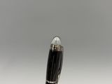 a pen that is sitting on top of a table