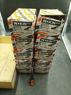 several boxes of workin are stacked on top of each other on the floor