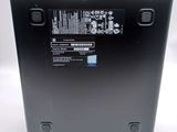 the back of a laptop with a battery attached to it