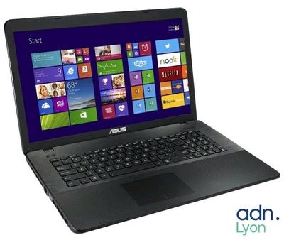 L'ordinateur portable ASUS est ouvert et prêt à l'emploi.