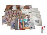 a lot of books that are sitting on a table