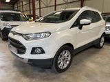 the white ford eco - pace is parked in a garage