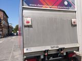 a truck that is parked on the side of the road