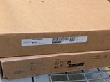 two boxes that are stacked on top of each other