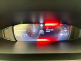 a car dashboard with a digital display on it