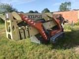 a small machine that is sitting in the grass