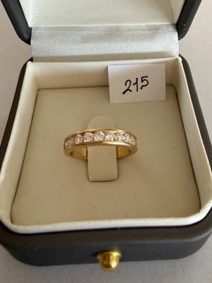 a ring in a box with a price tag on it