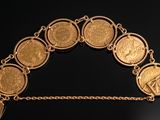 an image of a gold coin bracelet with a padlock on it