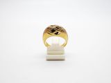 a gold ring with a black diamond in the center