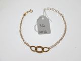 a close up of a chain bracelet with a price tag on it