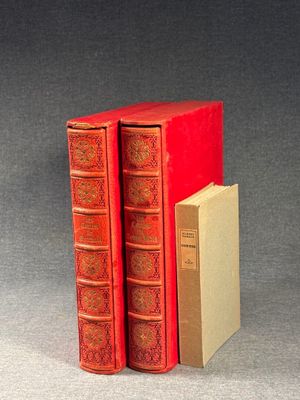two books sitting on top of each other on a table