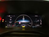 the dashboard of a car with a digital display on it