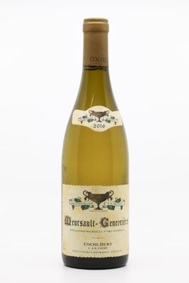 a bottle of wine that is sitting on a table