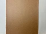 an image of a piece of brown cardboard on a white background