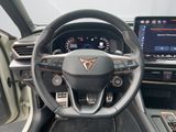the interior of a car with a steering wheel and dashboard controls