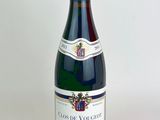 a bottle of wine that is sitting on a table