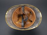 an image of a helmet that has been worn by a soldier